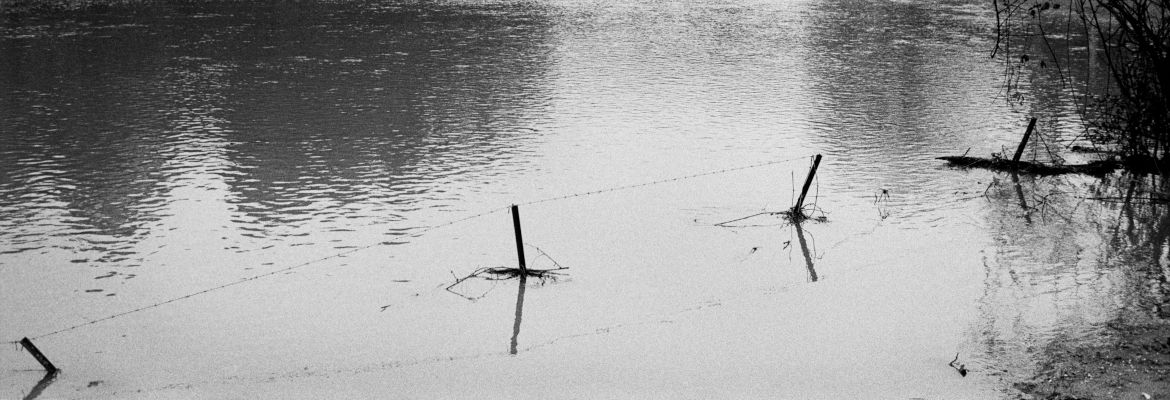 field flooded with water from mittagong creek, mount road, bowral, nsw