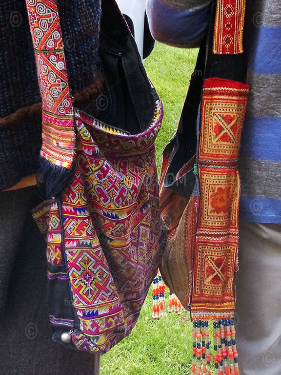 Image shows colourful shoulder bags. Corbett Gardens public protest meeting in relation to proposed coal mining by Hume Coal 07/03/2015. Guest speaker was shock jock Alan Jones who had property in the region. Coal mining application was subsequently refused a few years later.