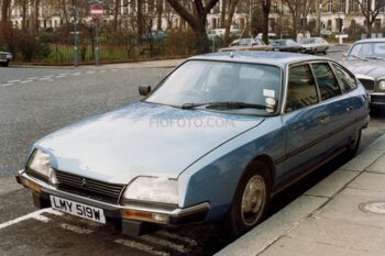 Classic vintage Citroen CX Pallas Automatic motor car in blue parked on a London street.