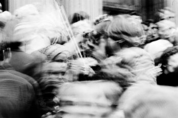 Long exposure, blurred image of peoples heads. Lord Mayor's Show street parade, City of London.