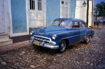 Vintage American car parked on a street in Camaguey, Cuba. 1997