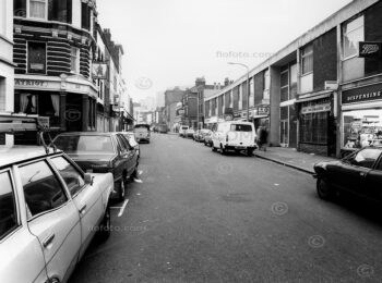 A vintage street scene in London's Lower Marsh, near Johanna Street, showing the long-gone Spanish Patriot pub and a Boots chemist.