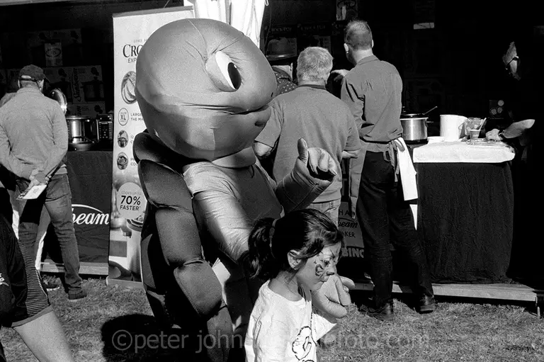 Visitors to Pie Time, Pie Fest 2019 (29 June), Giant turtle with friend. Bong Bong Racecourse, Bowral, NSW, Australia.