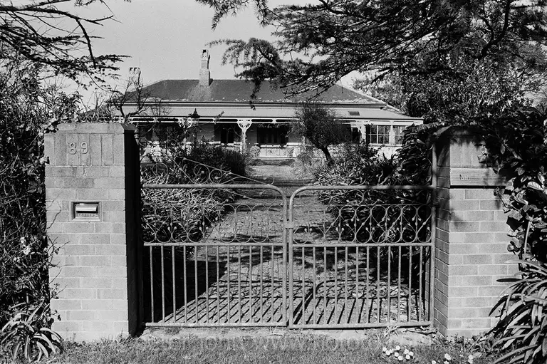 Residential frontage showing gates, Bowral suburbia. NSW, Australia