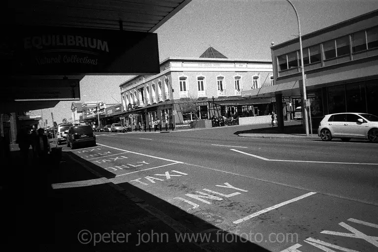 Sunlit roadside Taxi parking bays and rank on Bong Bong Street in Bowral, New South Wales, Australia. Ref: 609-18