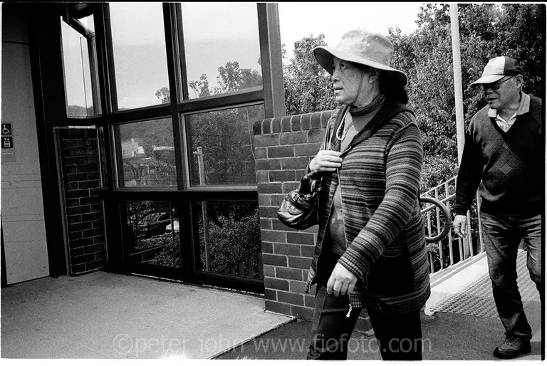 Tourist visitors to Bowral, a rural town in the Southern Highlands of NSW, returning to the railway station. Ref: 612-14