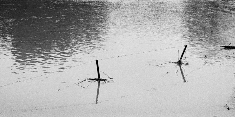 field flooded with water from mittagong creek, mount road, bowral, nsw