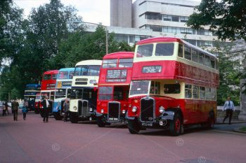 Image shows row of old buses. Display of vintage transport vehicles Museum Avenue, Cardiff, South Wales. An event as part of the Queens' Silver Jubilee celebrations. Photo July 1977